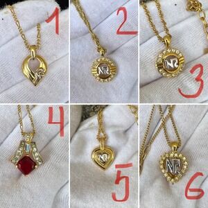 Vintage Nina Ricci Gold Tone Rhinestone Pendant Necklace designer Jewelry